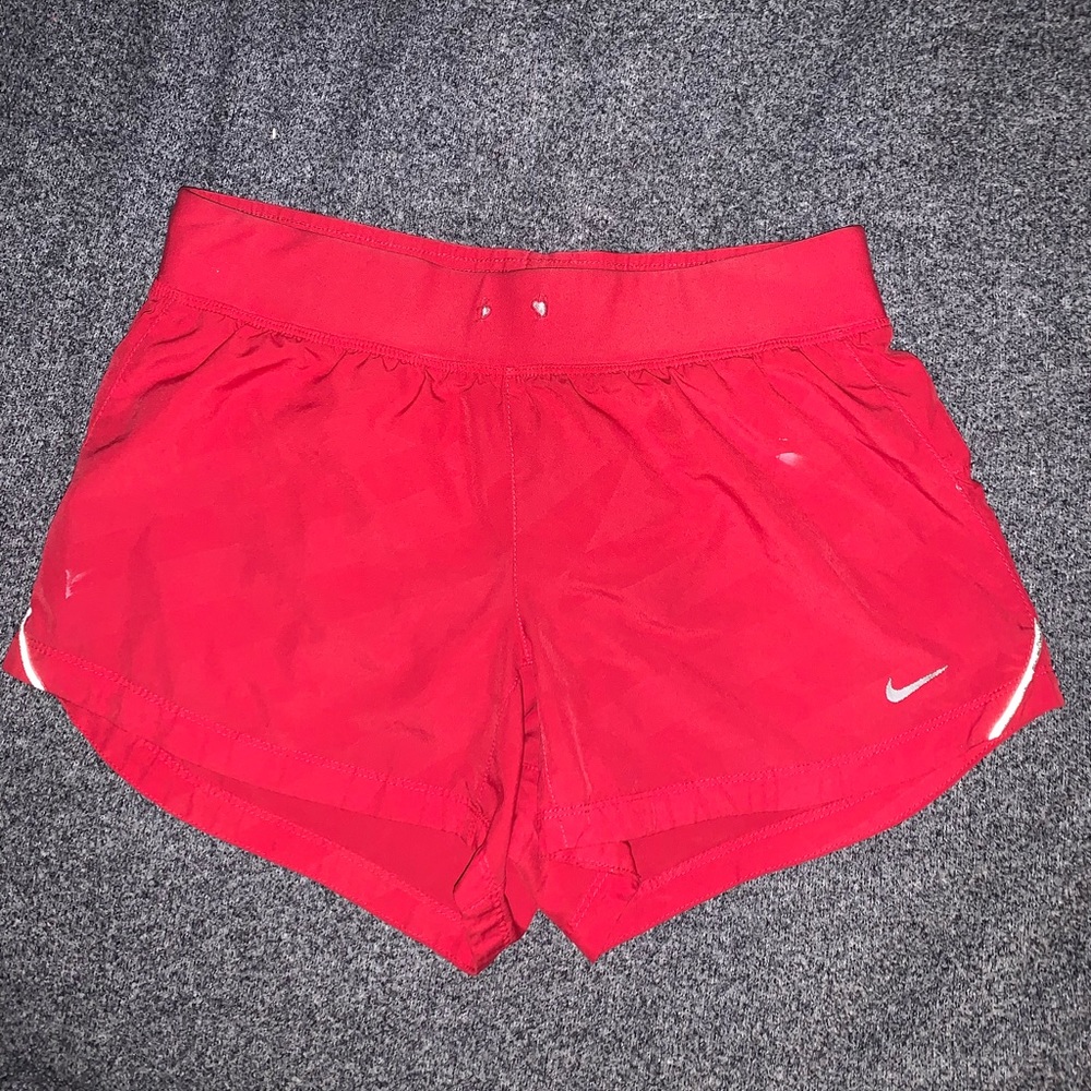 red nike shorts